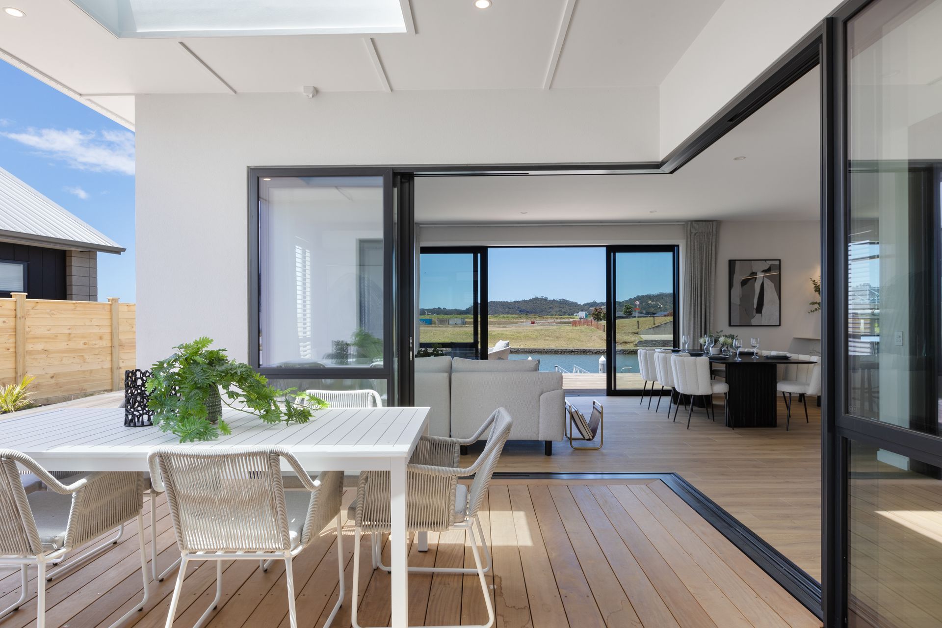 “The clever addition of pillarless stacker doors, which open up the living space, is a key element of this design – allowing seamless integration into the covered outdoor dining area.”