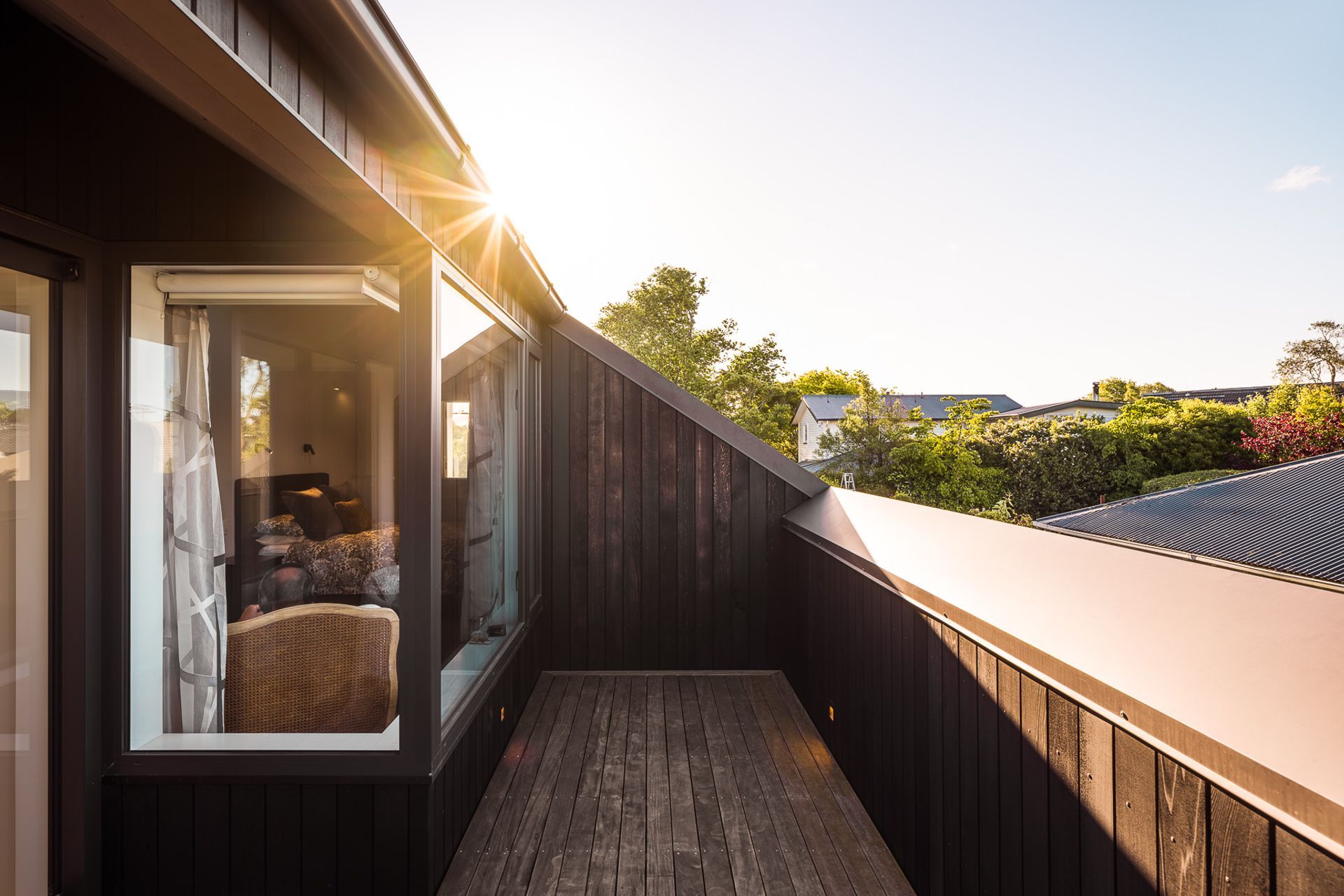 The upstairs balcony joins the two main bedrooms.