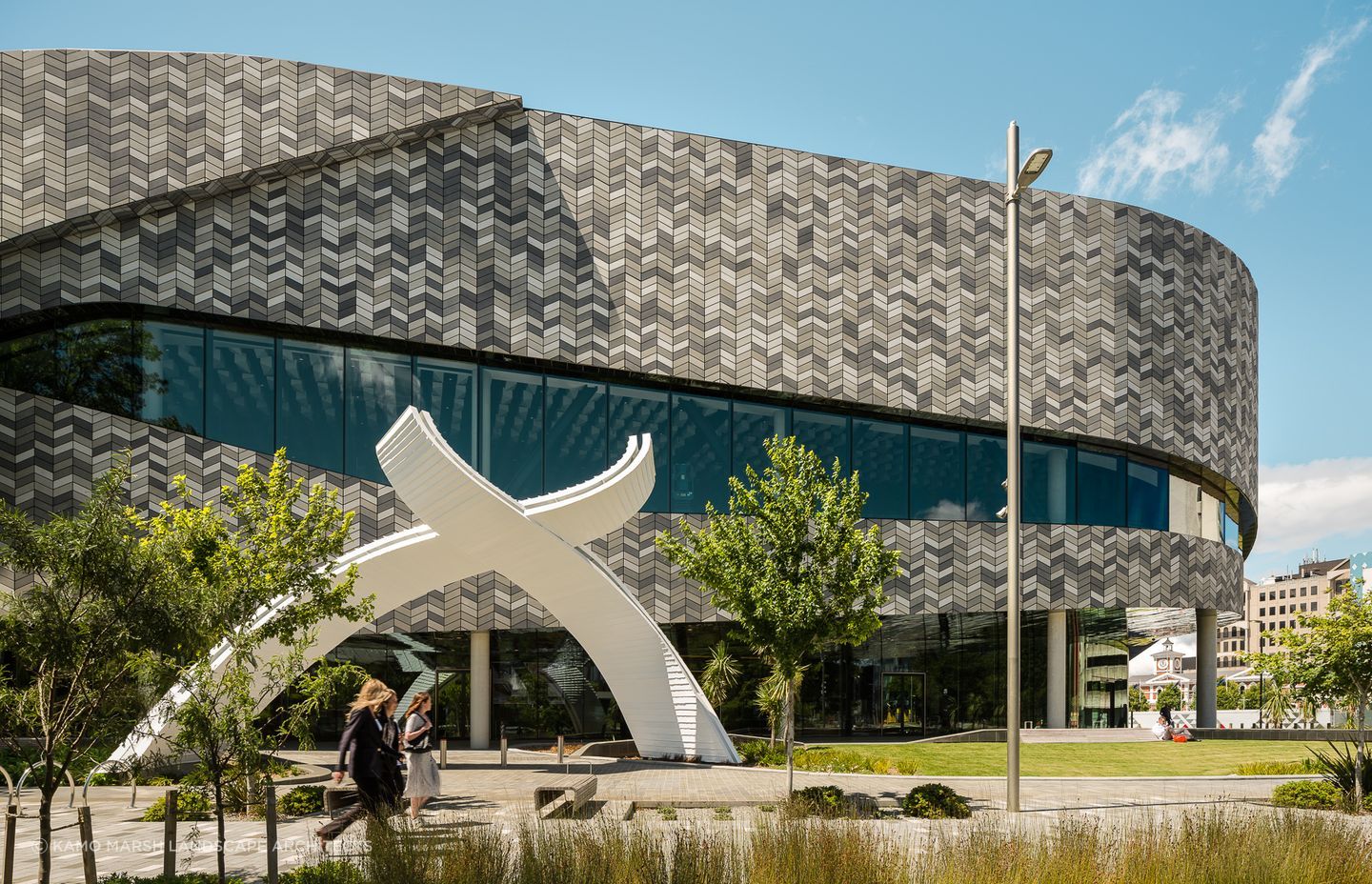 Designed by Simon Kaan and Rachael Rakena, the sculptural archway provides a ceremonial threshold and gateway into the building.