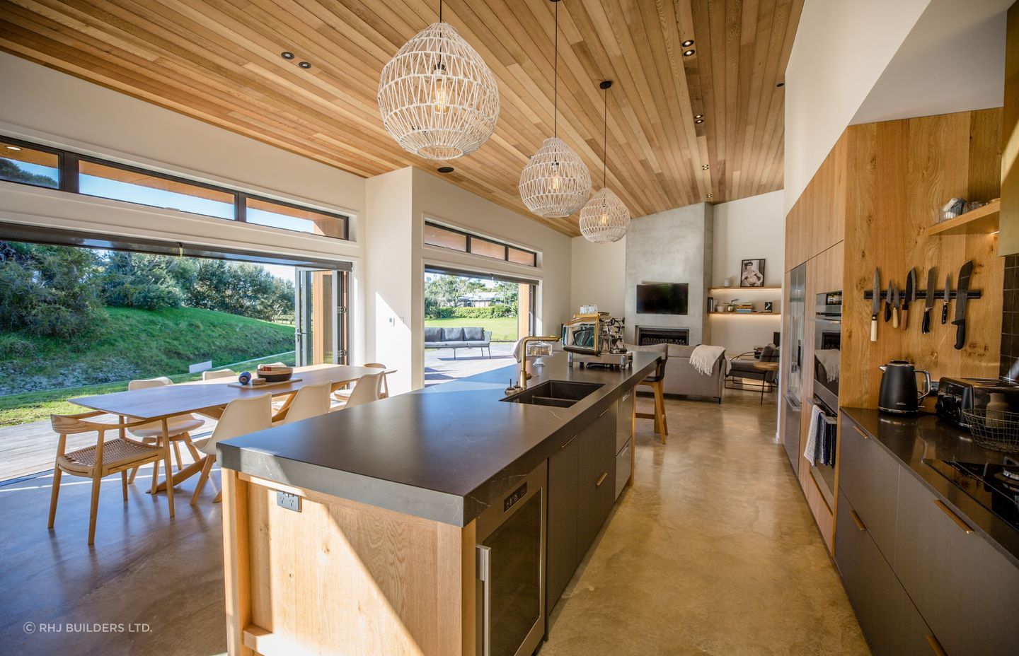 The use of cedar continues inside the home for a cohesive, warm look.