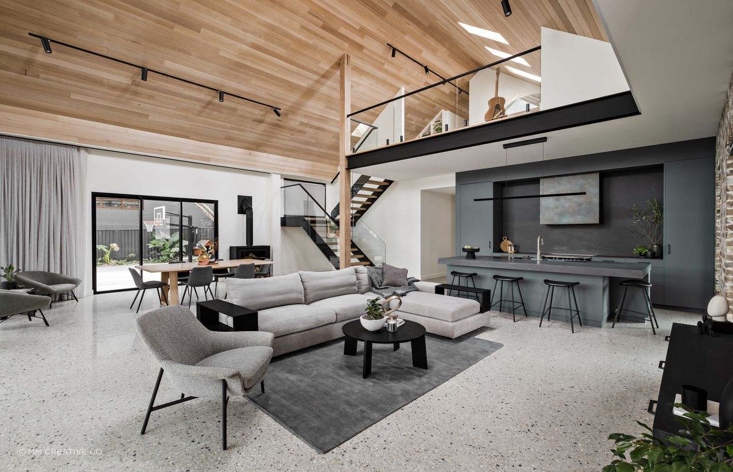 A wide central hallway downstairs leads to the boys' bedrooms and master suite, while upstairs the teenage retreat s open and airy.
