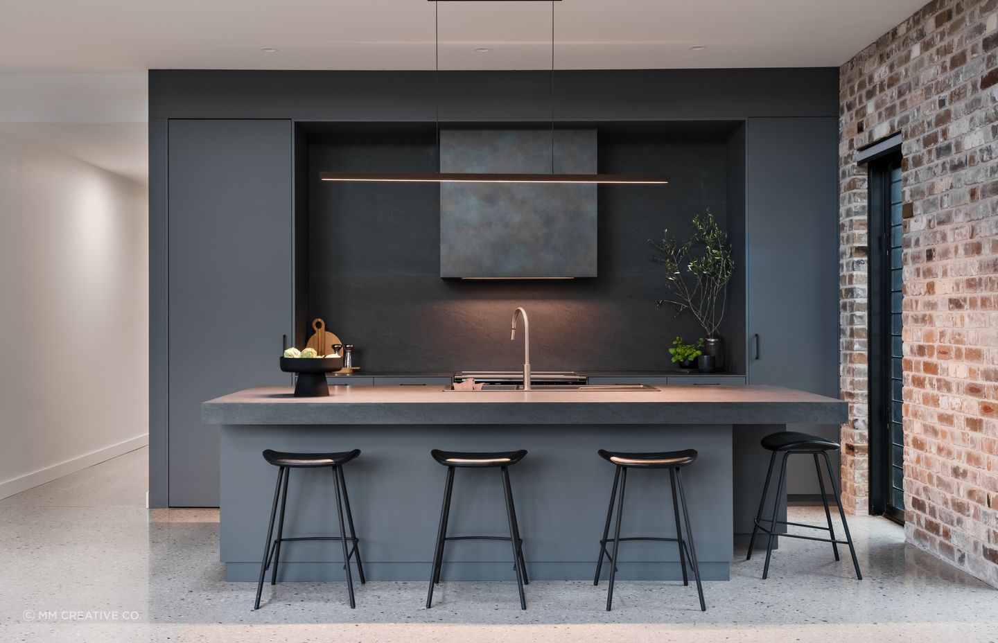 A butler's pantry behind the kitchen means the kitchen remains uncluttered.