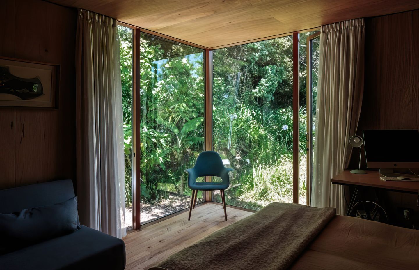 Blurring the boundaries between inside and outside, this room is designed to allow the cool filtered light and rich smell of the bush to permeate the space for a more intimate experience with the land.
