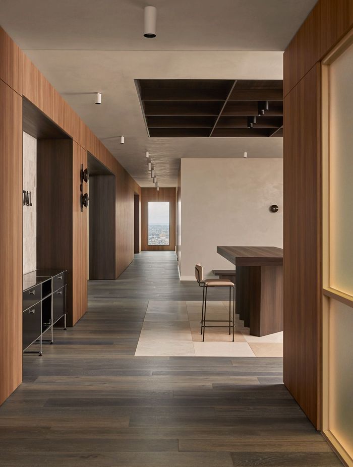 Contrasting timber tones add interest to the muted palette.