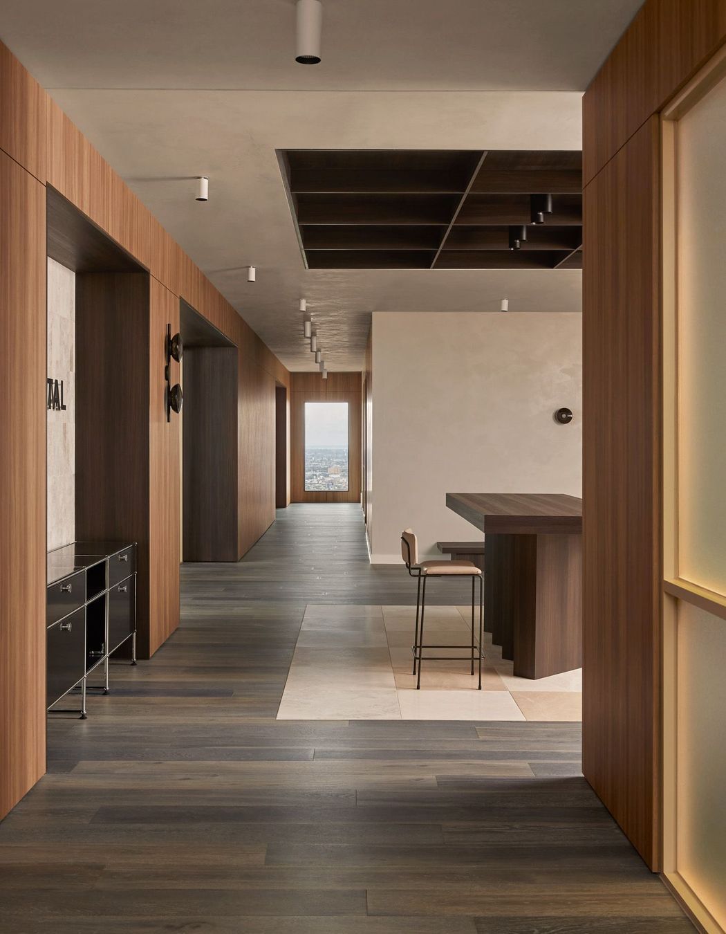 Contrasting timber tones add interest to the muted palette.