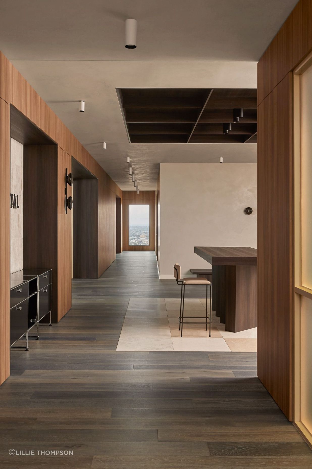 Contrasting timber tones add interest to the muted palette.