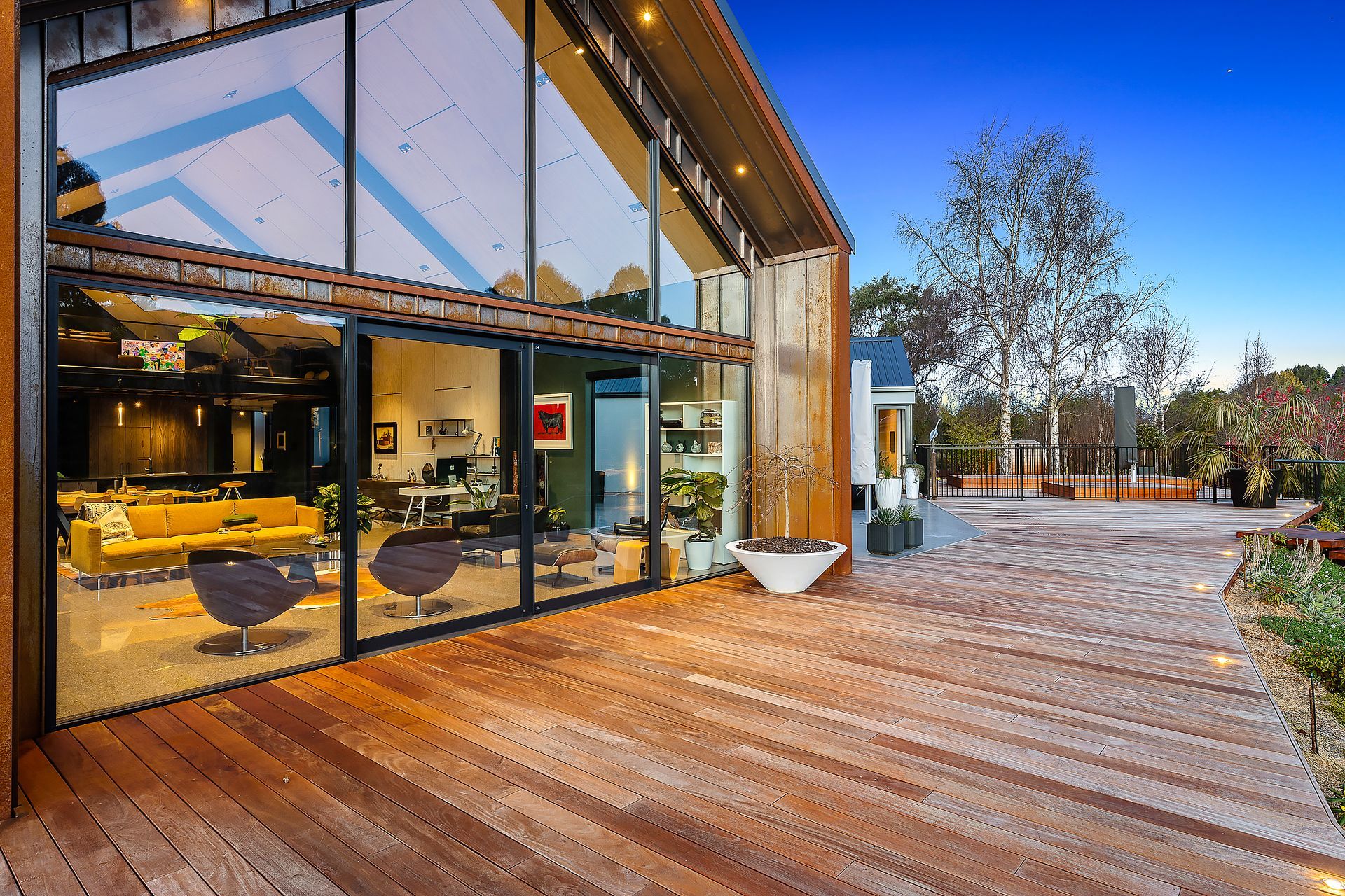 The home's corten cladding will age and patina over time and continue to complement the surrounding natural landscape.