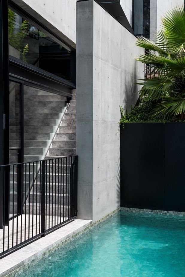 The pool is adjacent to the playroom and music room downstairs.