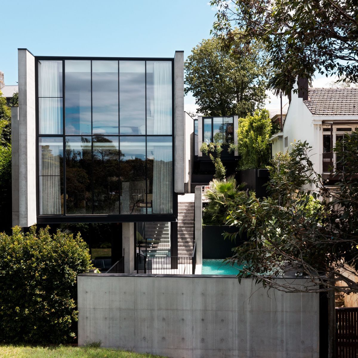 A formidable three-storey concrete home designed for togetherness