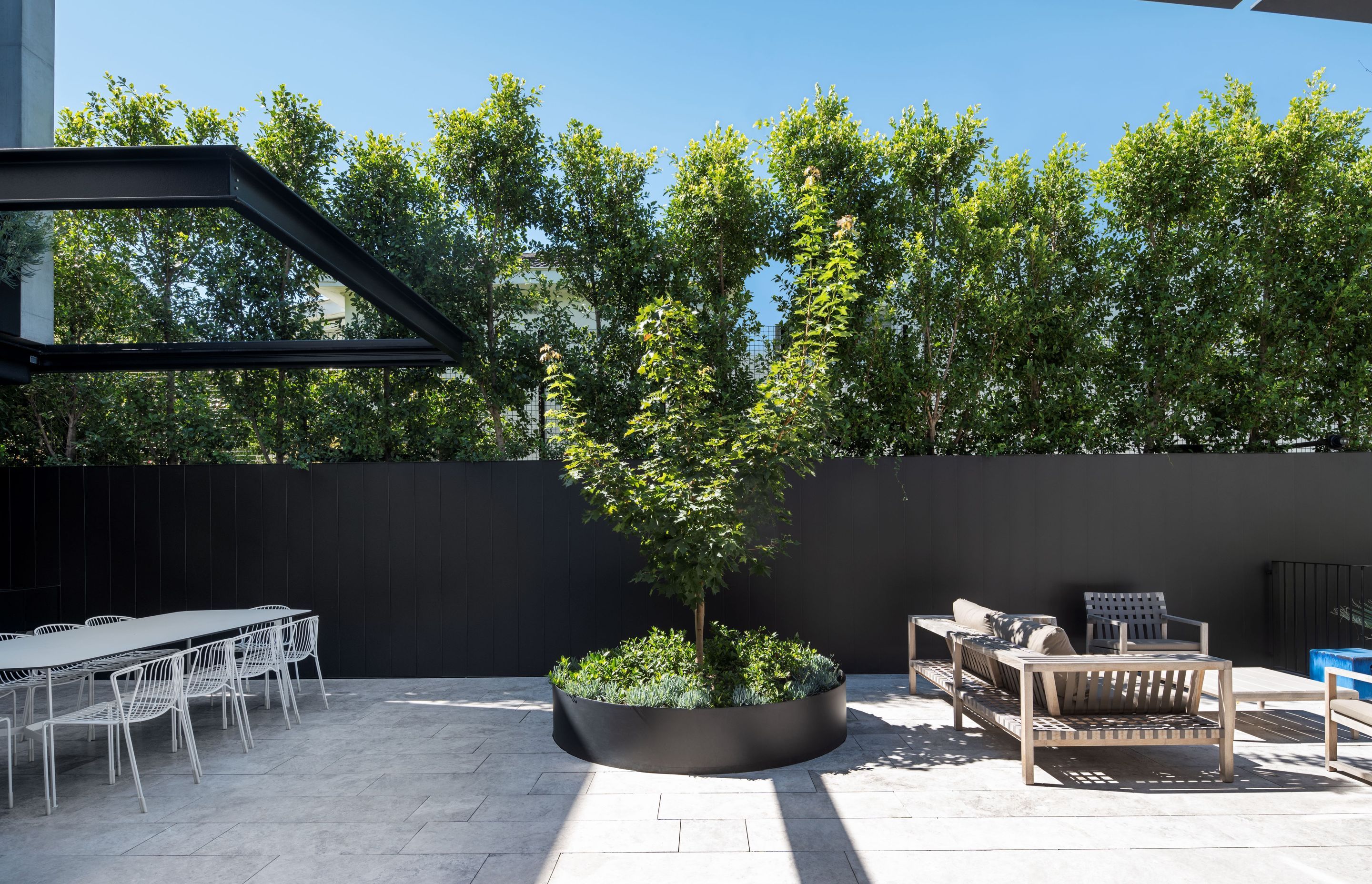 A central courtyard on the mid-level is the perfect spot for entertaining outdoors.