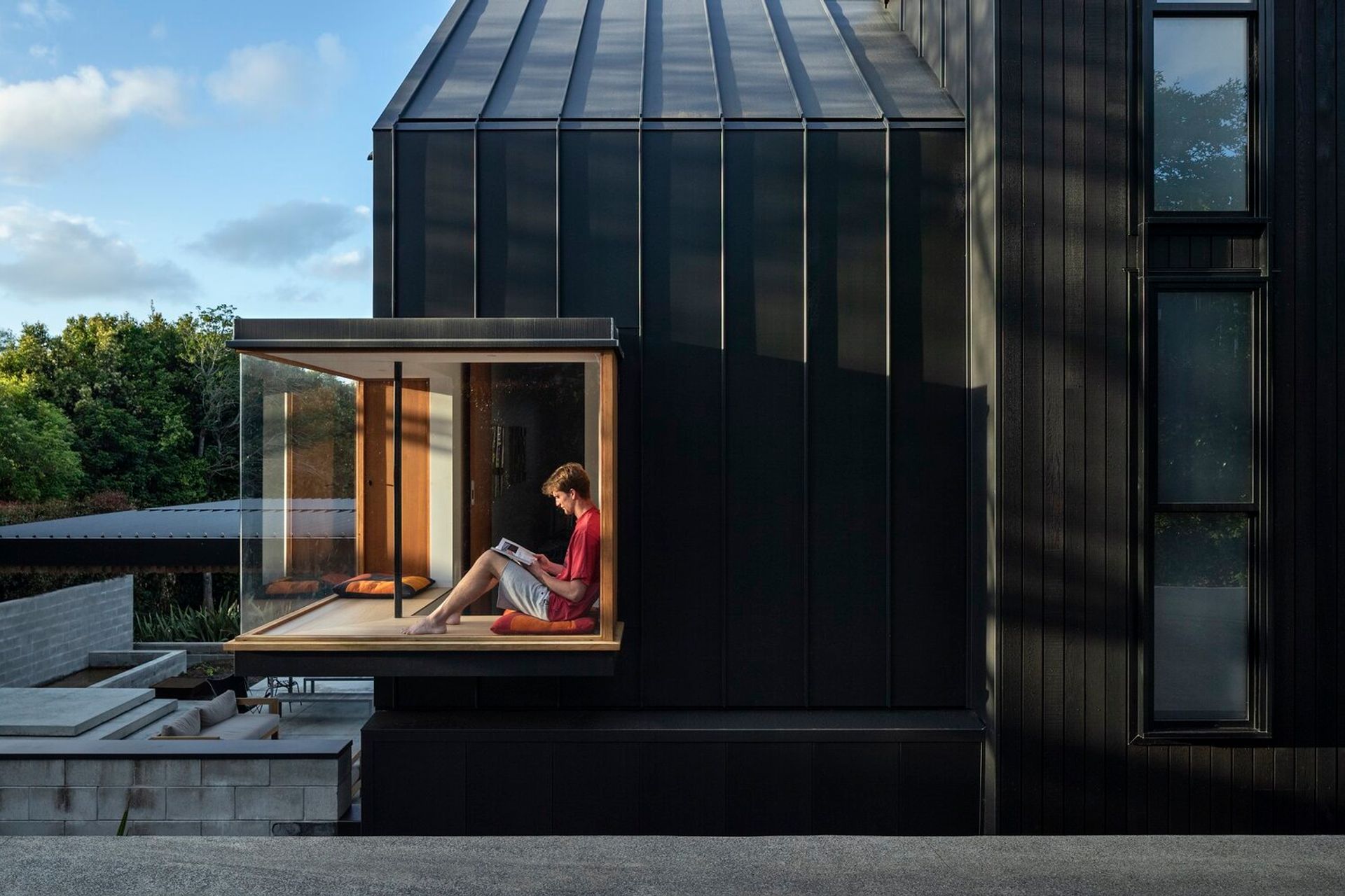 A modern bay window makes a for an incredibly relaxing spot