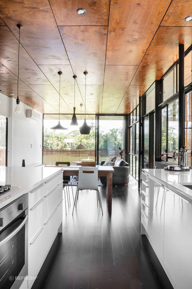 A minimalist palette of finishes and colours create a calming and welcoming atmosphere. Photography: Damien Bredberg Photography