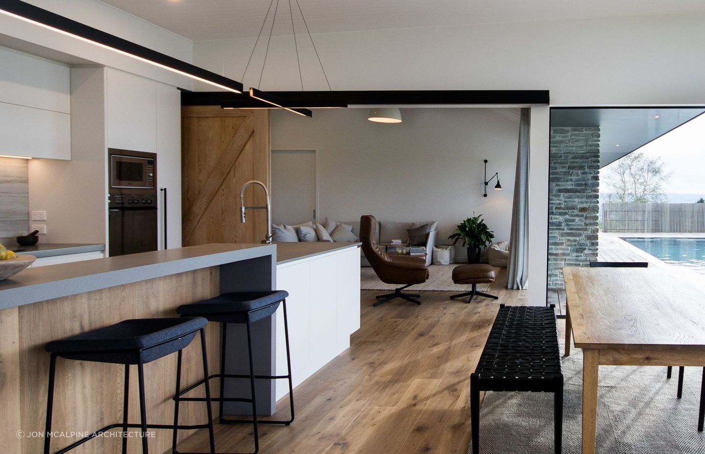 Sliding barn doors are a traditional inclusion in a modern space.