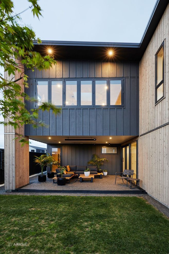 A nicely sheltered outdoor living space is built into the design of the home. | Photography: Amanda Aitken
