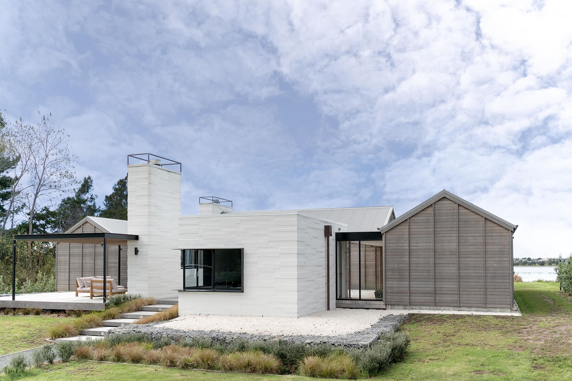 The large white bricks and industrial flashings give the Point Wells House a contemporary edge.