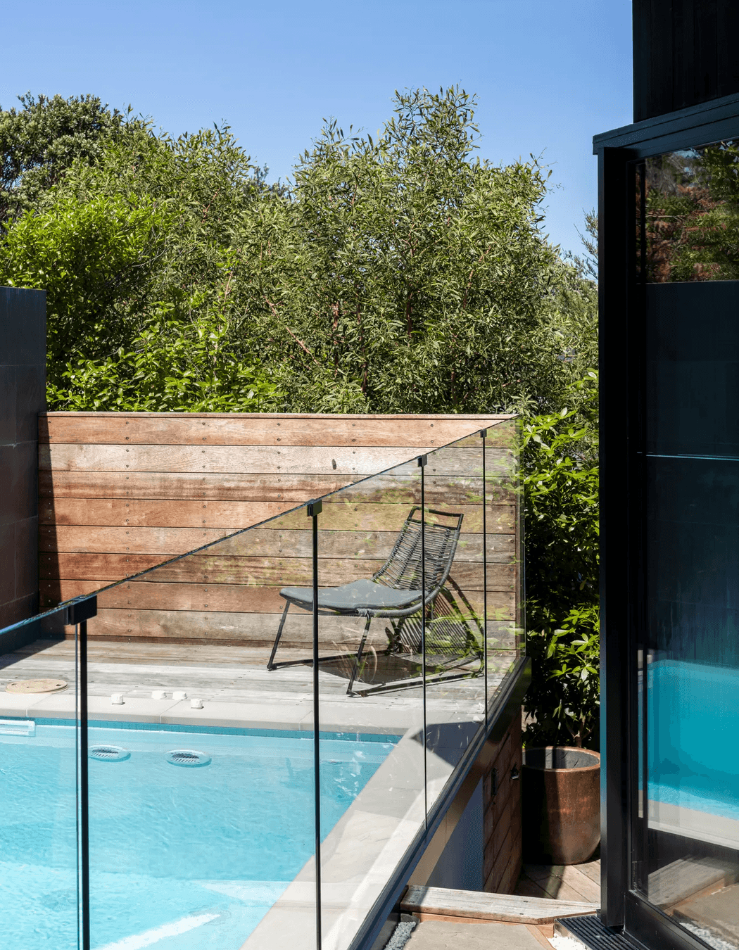 The swimming pool — a sort of bookend to the living room.  Described by Jonathan as the home's 'little blue jewel'.