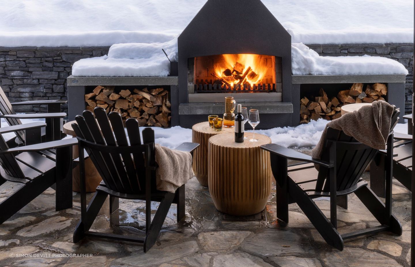 In summer the great room doors open out from the dining area to this terrace.