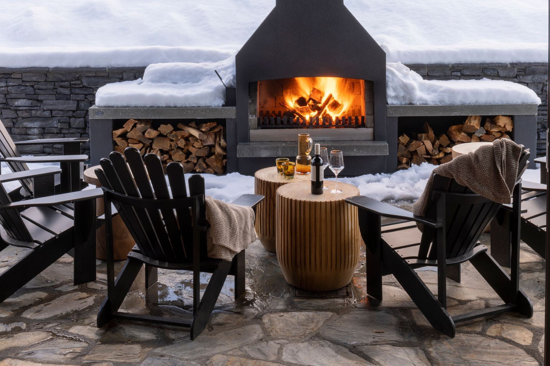 In summer the great room doors open out from the dining area to this terrace.