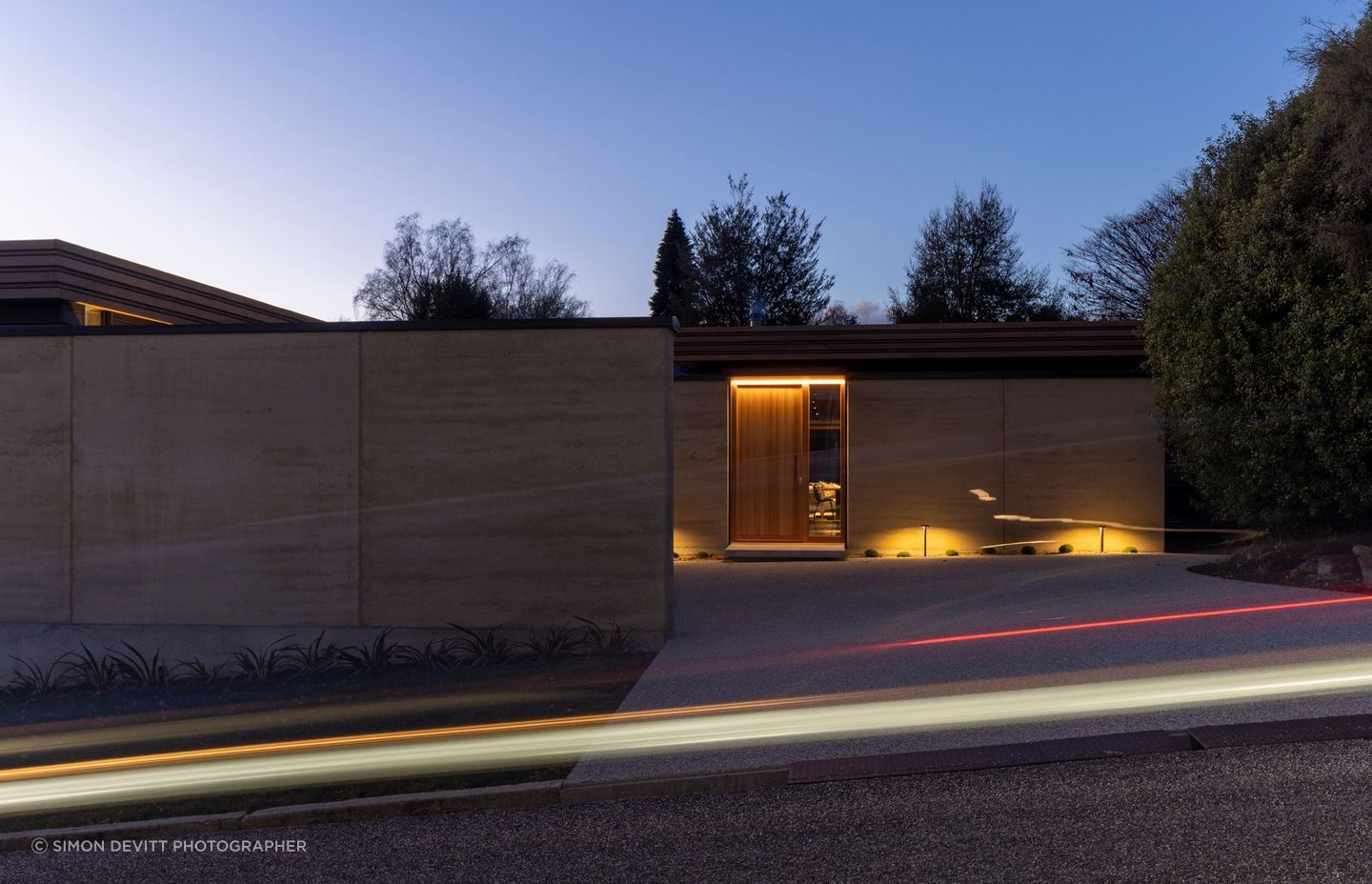 The south face of Winding Roof House, secluded from the streetscape. | Photographer: Simon Devitt