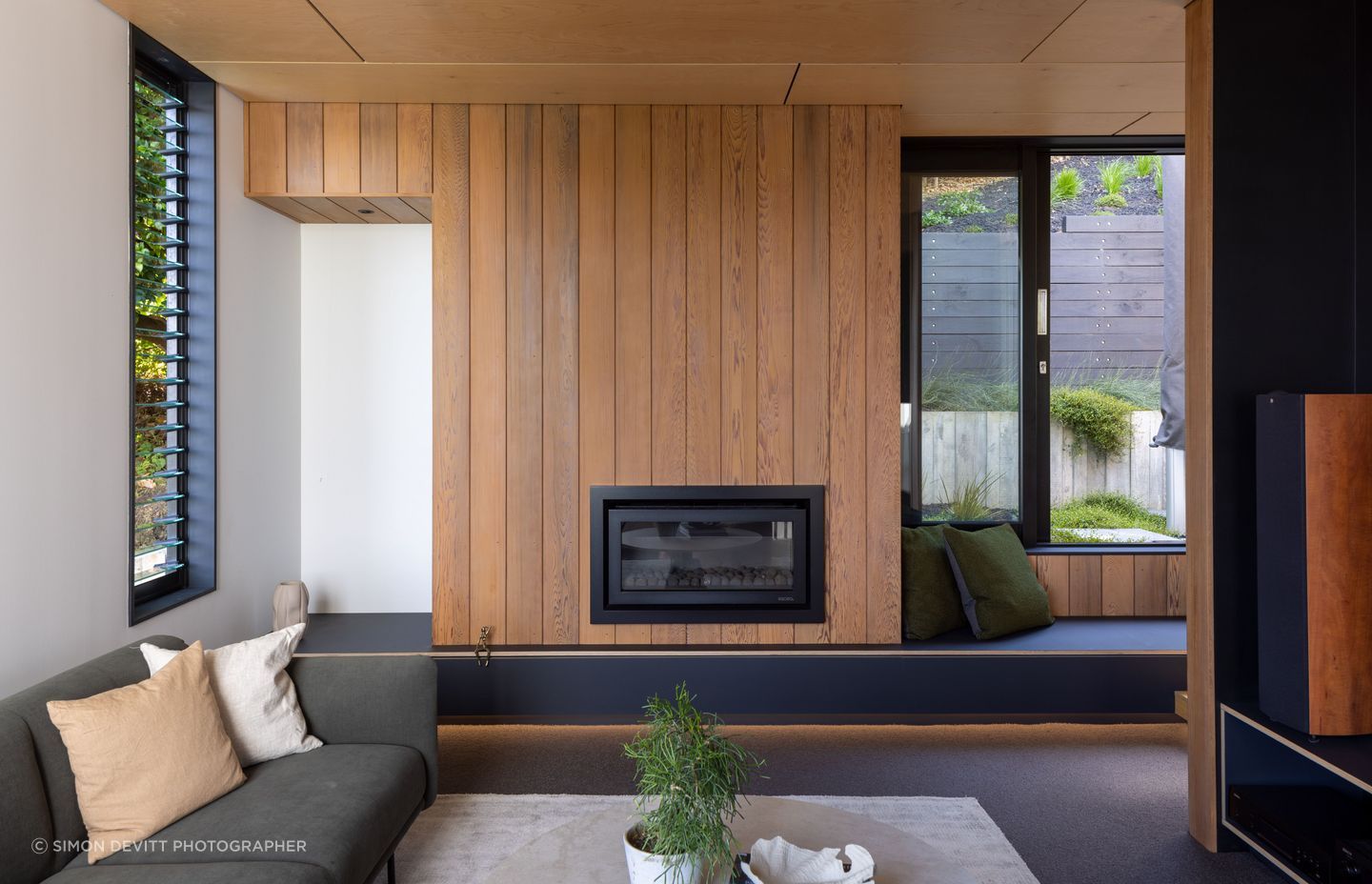 Ascending to the second level from the entry, the home expands into the main living floor.
