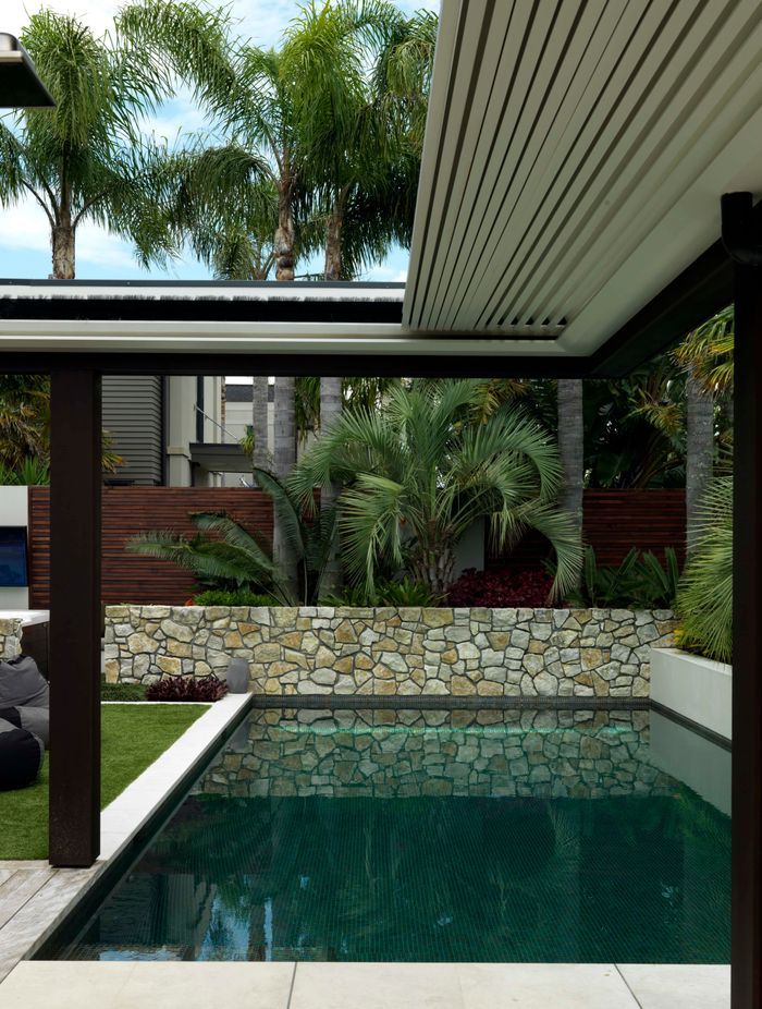 Te Kuiti limestone from Island Stone was chosen and two Johnson and Couzins concertina louvre roofs were installed to offer the option of shade. 