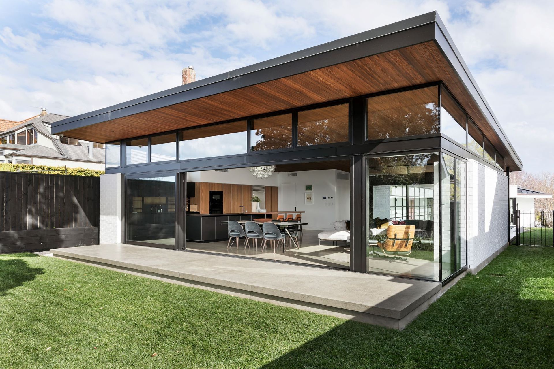 A sophisticated blend of history and luxury personifies this Remuera House featuring stepped brickwork.