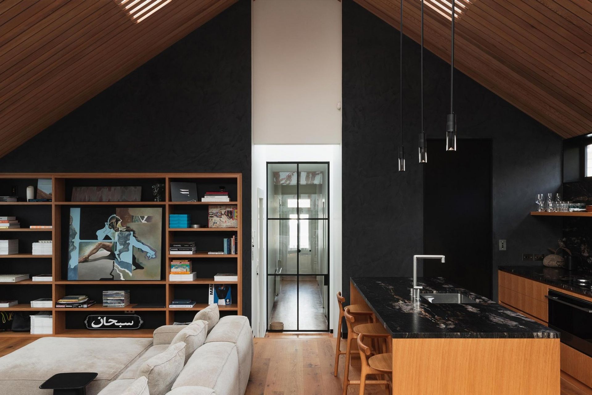 The black modern extension at the rear adds a whole new dimension to the interior design. | Photography: Jeremy Hooper