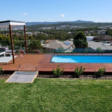 Elevate a sloping site with a compact pool and alfresco leisure zone