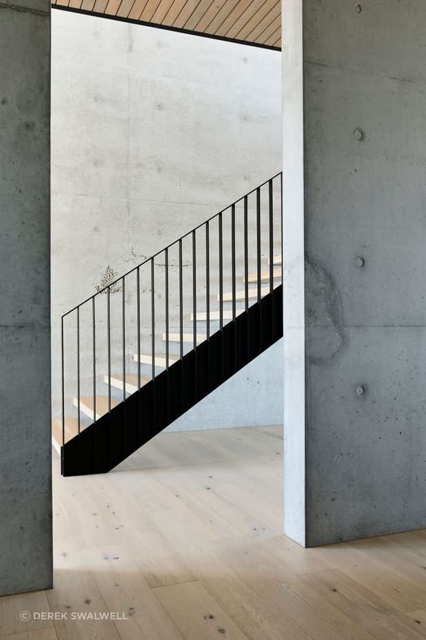 The stairwell lets light into the bottom floor.