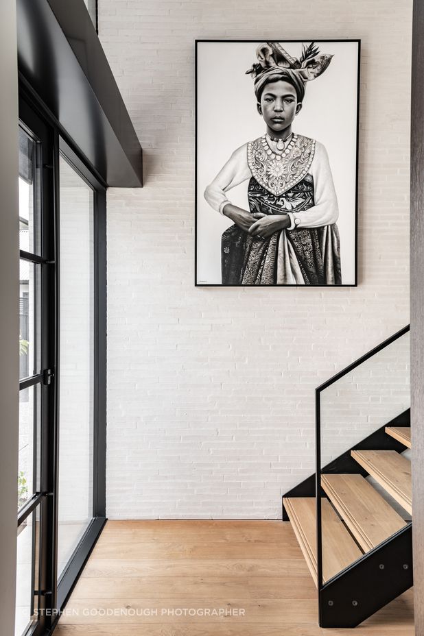 In the entrance, the warmth and texture of the custom made Canterbury Clay Bricks is carried through from the exterior. Tobin says he specified quite a thin profile at the request of the client.