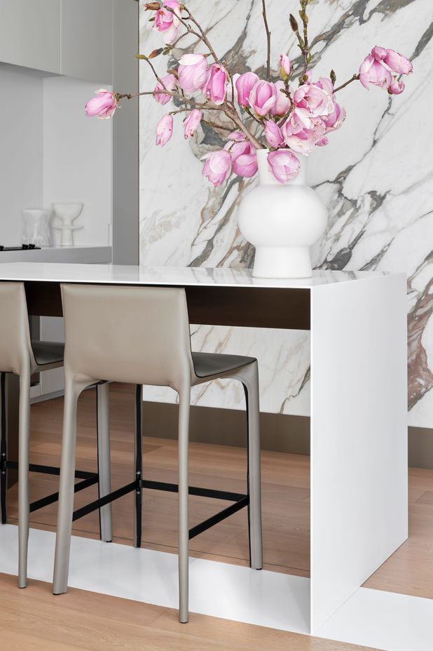 The kitchen bar is cleverly designed to hide its storage.