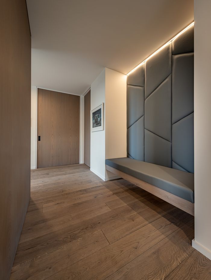 Homeowner Barry Timmings came up with the concept of the custom-built seating in the entry hall. “We just sketched up something to formalise that,” says Warwick.