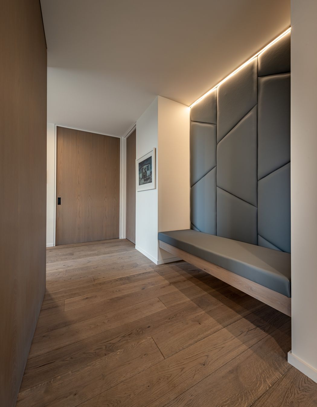 Homeowner Barry Timmings came up with the concept of the custom-built seating in the entry hall. “We just sketched up something to formalise that,” says Warwick.