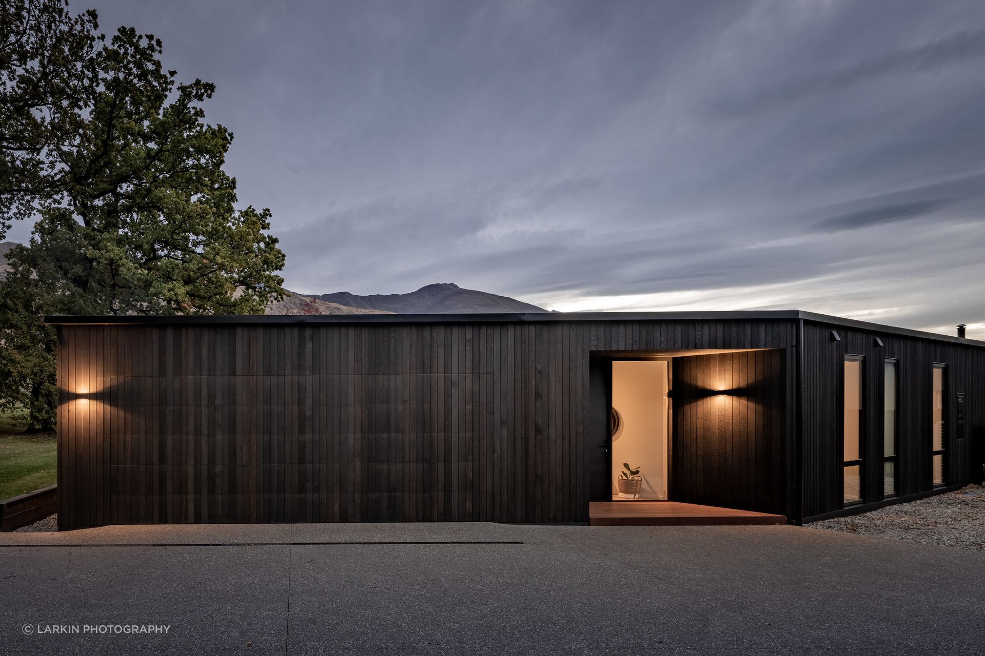 The sleek holiday home in Wanaka designed by Warwick McLaren of McLaren Architecture.Design presents a simple facade. “The built form isn’t too tricky. The house was definitely done cost-effectively but in the end this doesn’t limit it.”