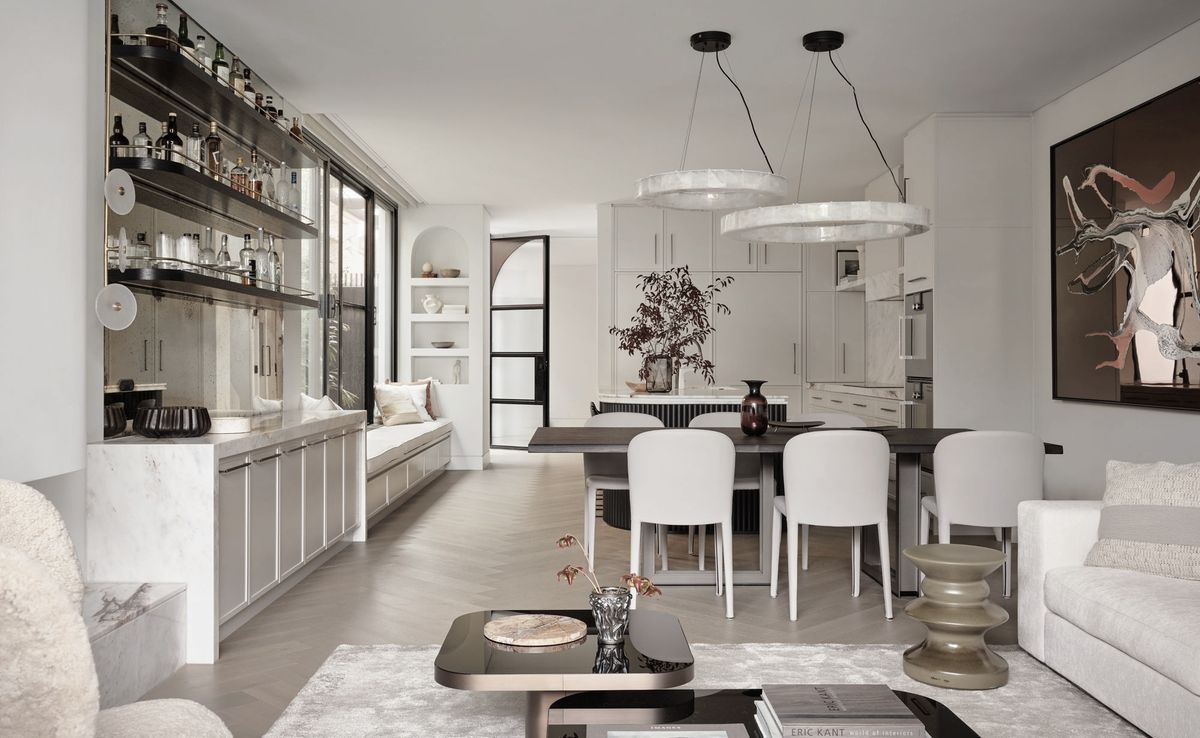 Spatial acrobatics and masterful composition transform this standard duplex into two extraordinary homes