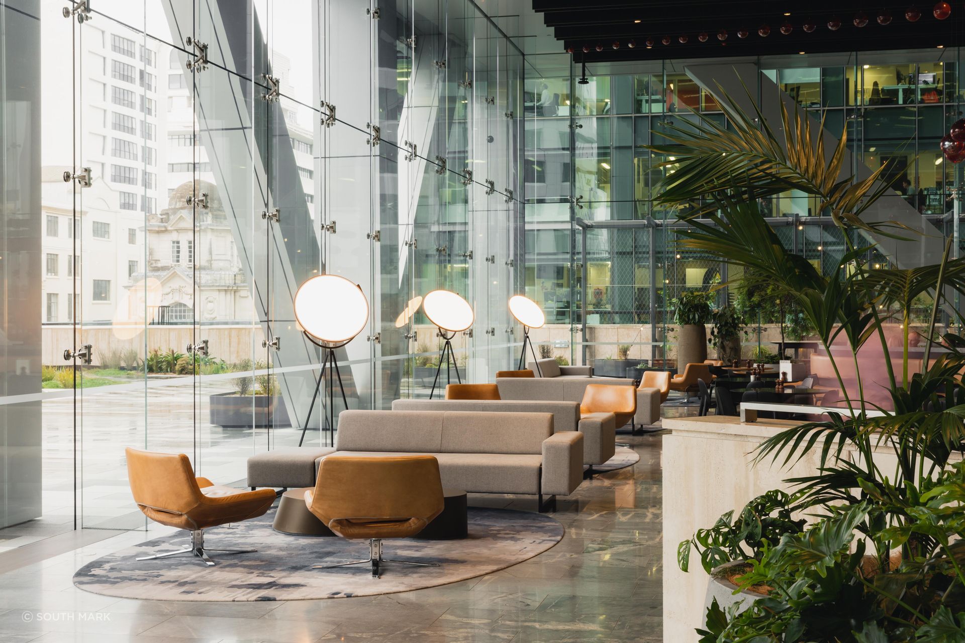 Materials are both soft and hard-wearing, with inviting fabric sofas and leather accent chairs.