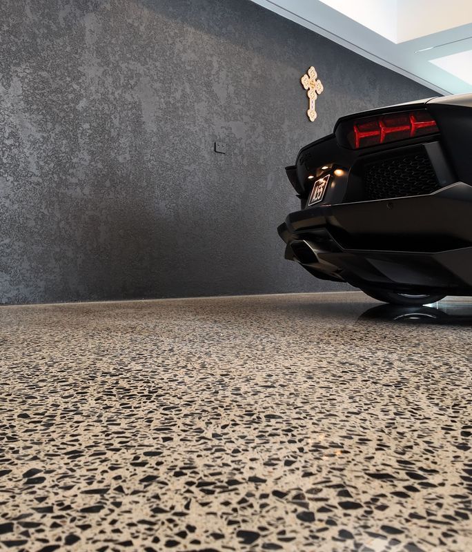 Transforming a prestigious Sydney garage into a luxury car showroom with polished concrete