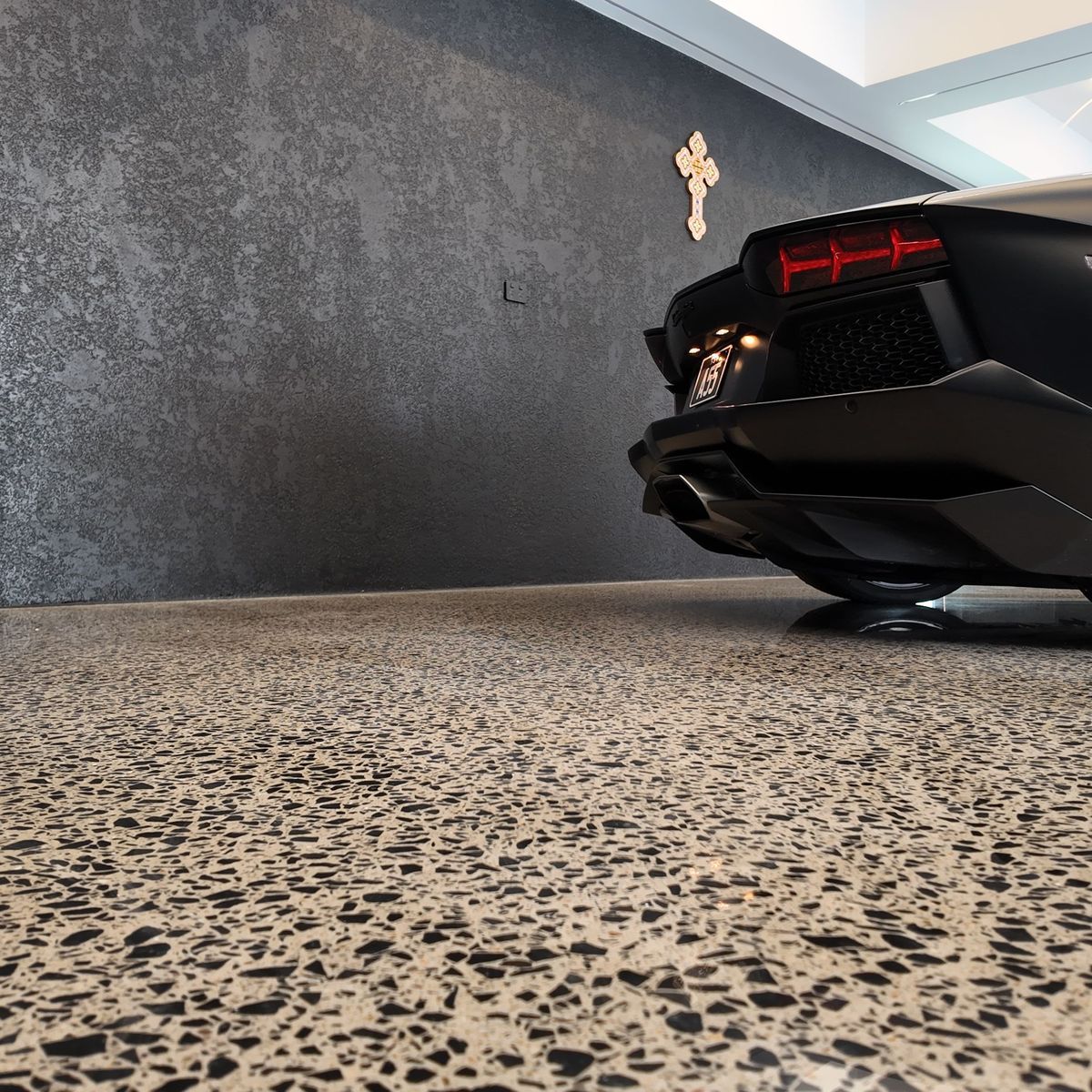 Transforming a prestigious Sydney garage into a luxury car showroom with polished concrete