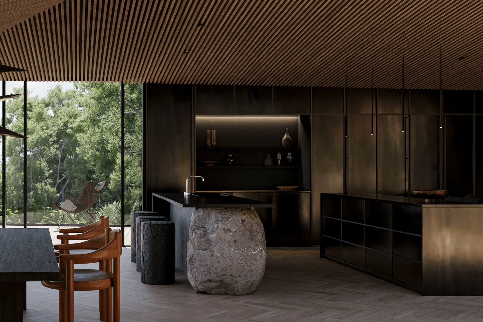 The sleek black kitchen was designed to contrast against the nearby greenery.