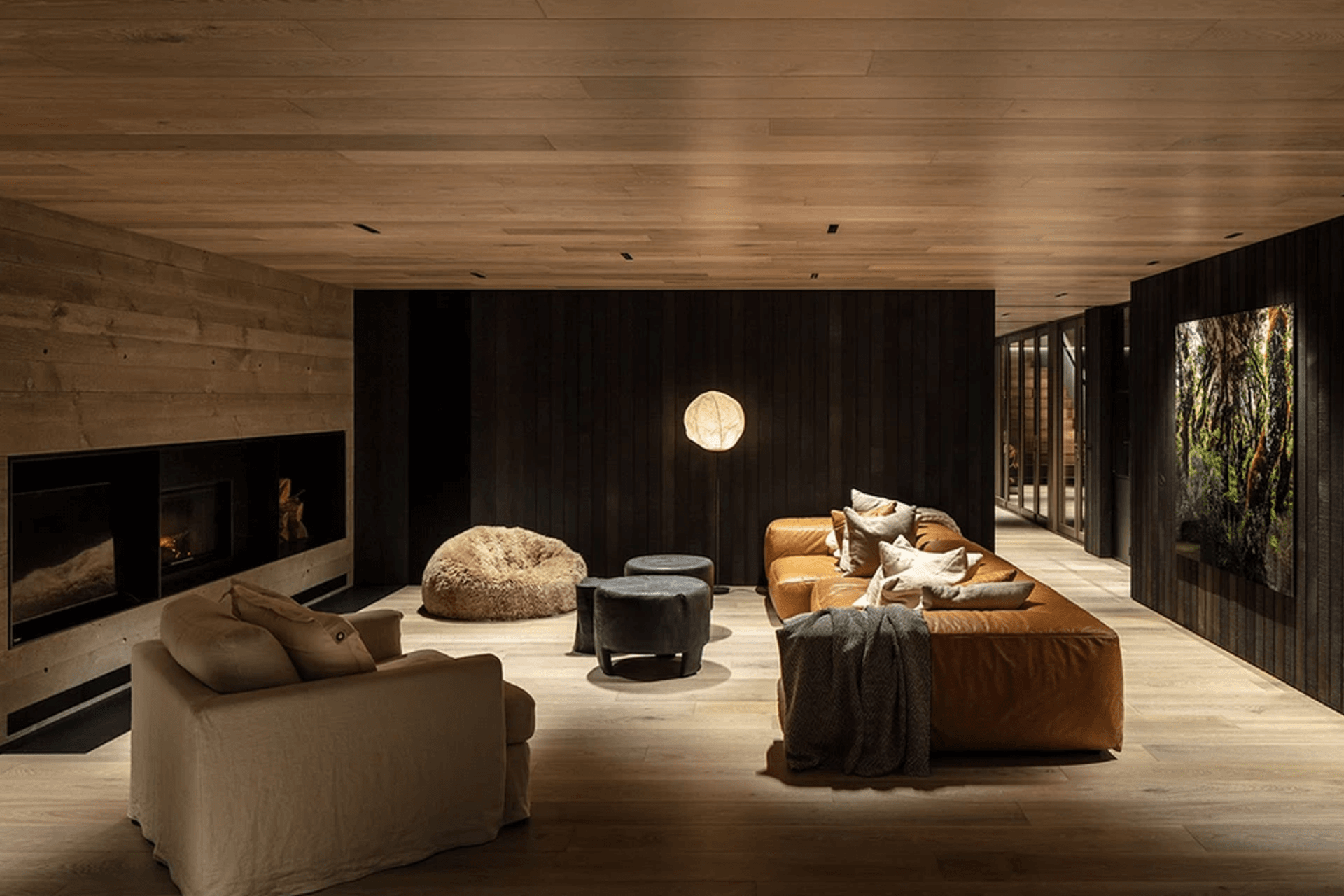 The living area floors and ceilings are by Forté Flooring. Fiona designed the sofa and it had it made, and the bean bag is Wilson &amp; Dorset.