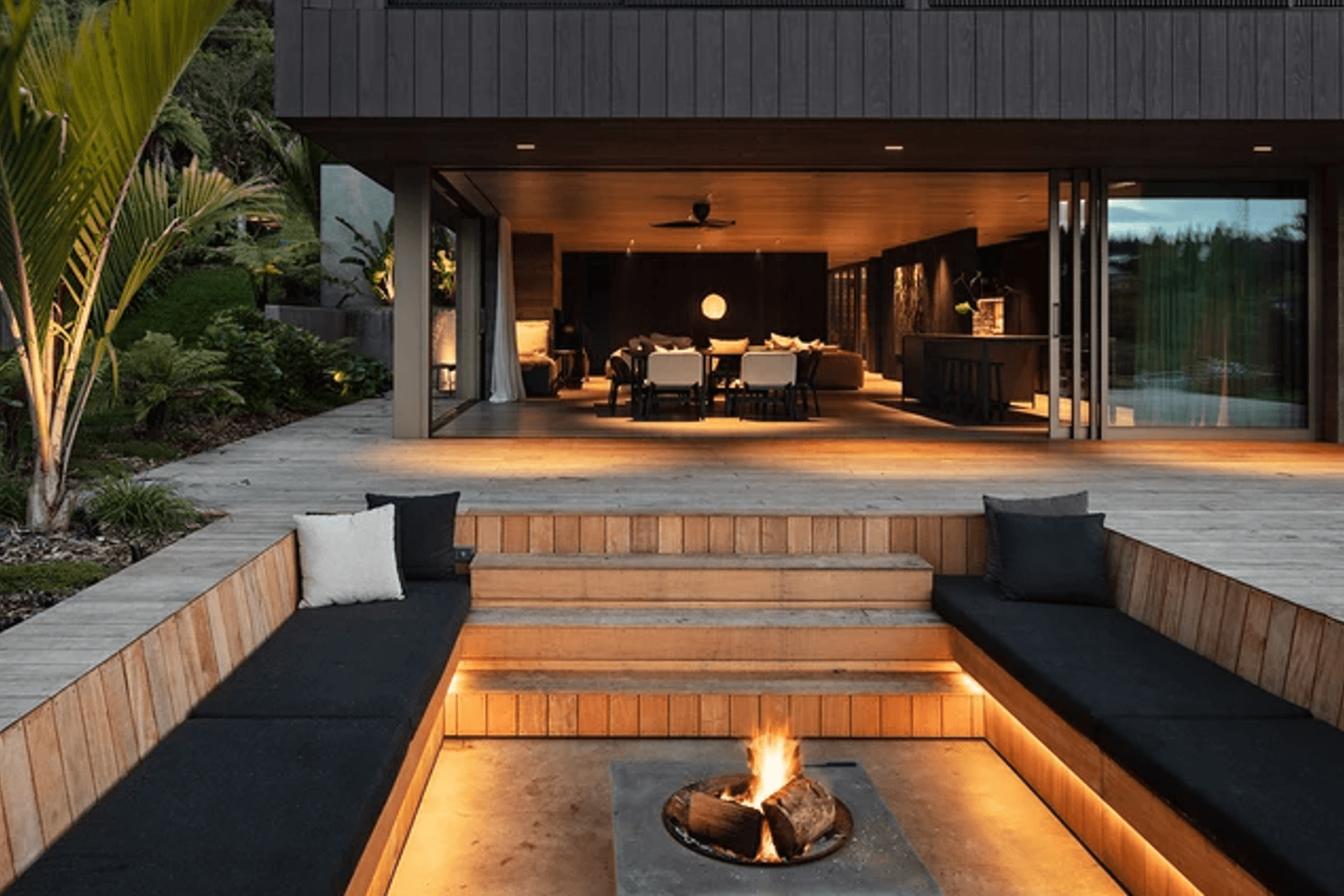 “Everyone walks along the lake,” says Evelyn. “We put the sunken firepit here so people can see you and wave out. It’s really social.”