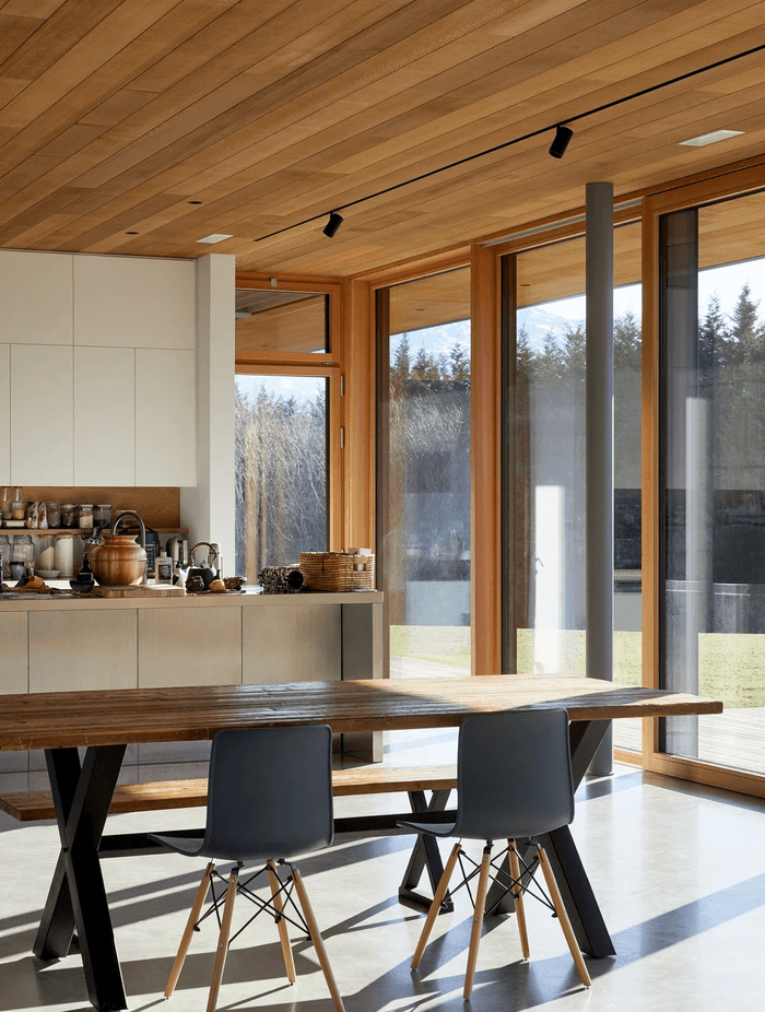 Timber ceilings warm the space.