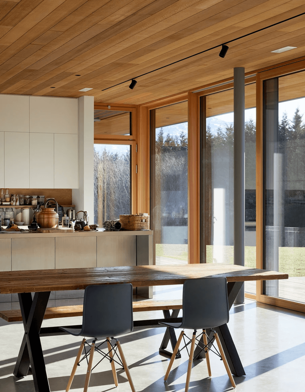 Timber ceilings warm the space.