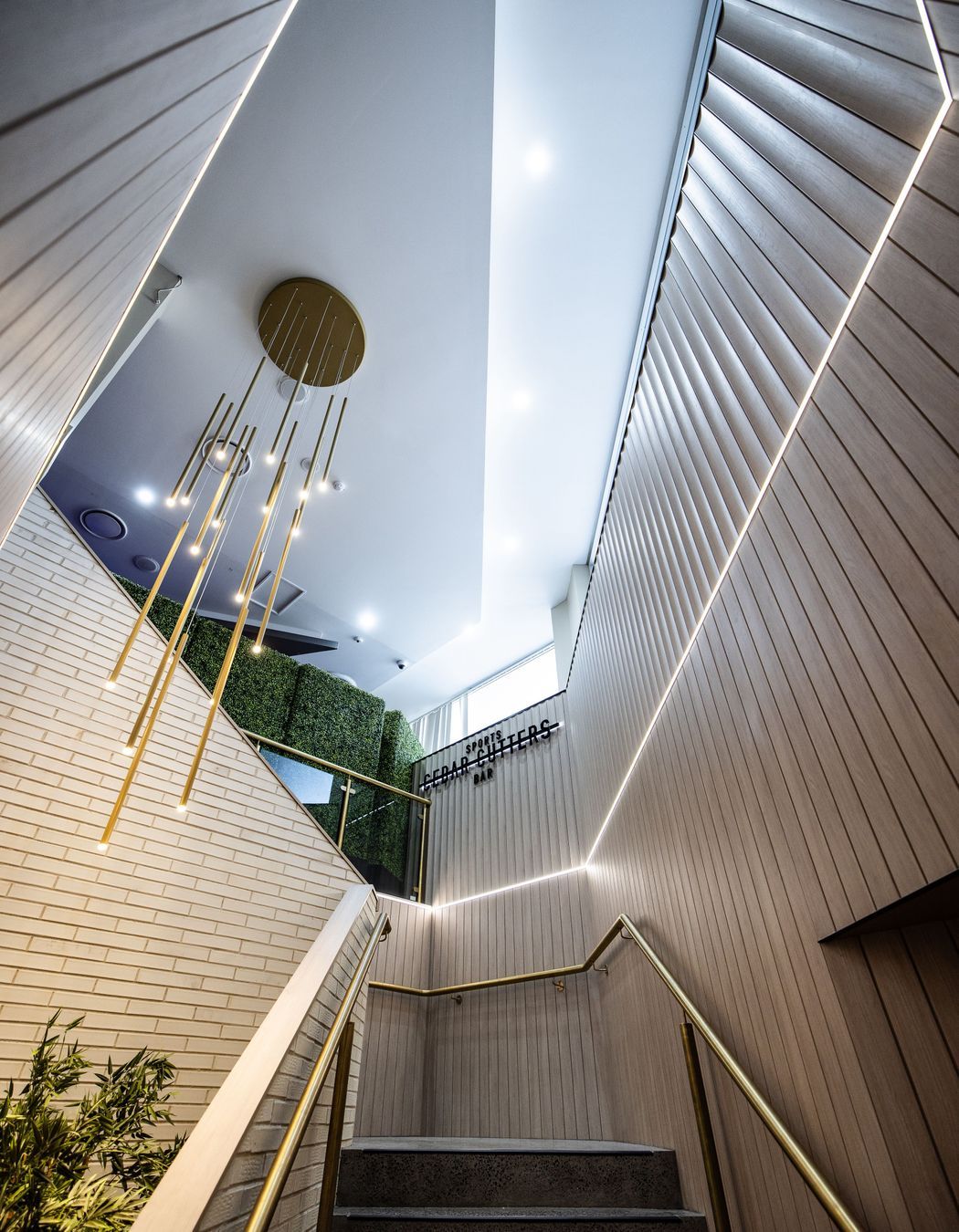 Screenwood PANELS rangge in Flute line the stairwell.