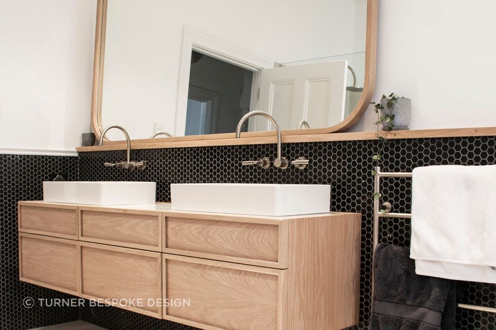 Black honeycombed shapped tiles line the walls | Photos by Jennifer Turner