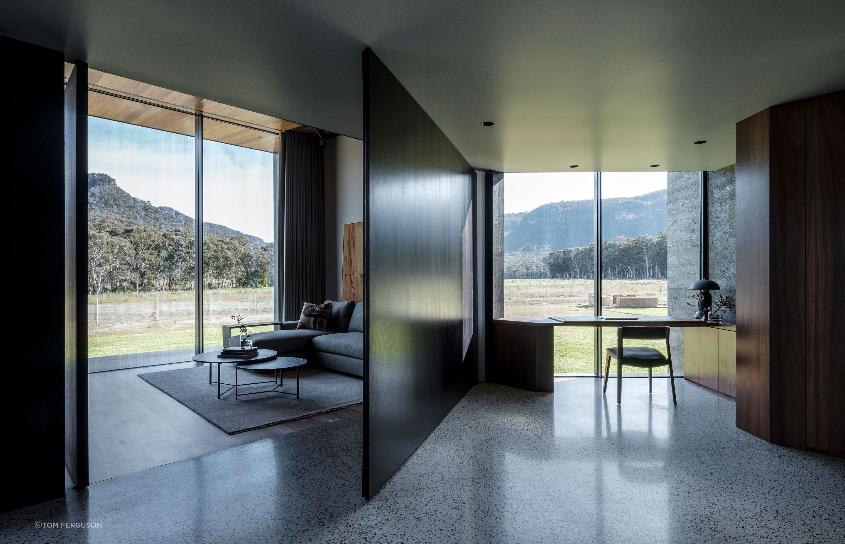 The home office boasts a large pivoting four-metre black wall; transforming the room into a lounge area, a private study or an additional bedroom.