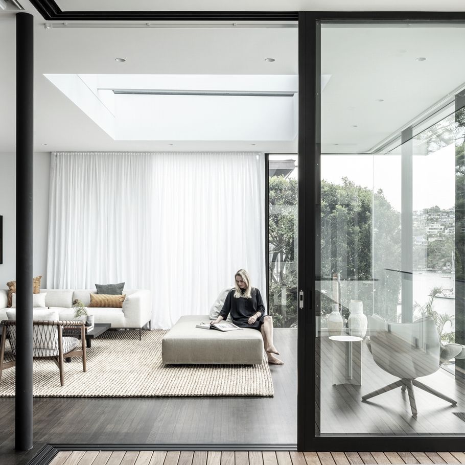 A serene and sophisticated abode cascading down to the water