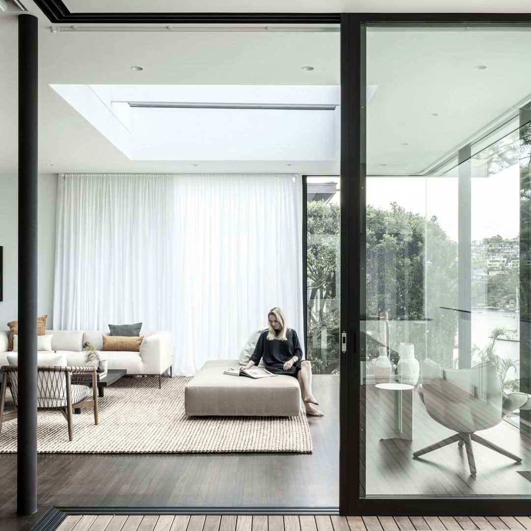 A serene and sophisticated abode cascading down to the water