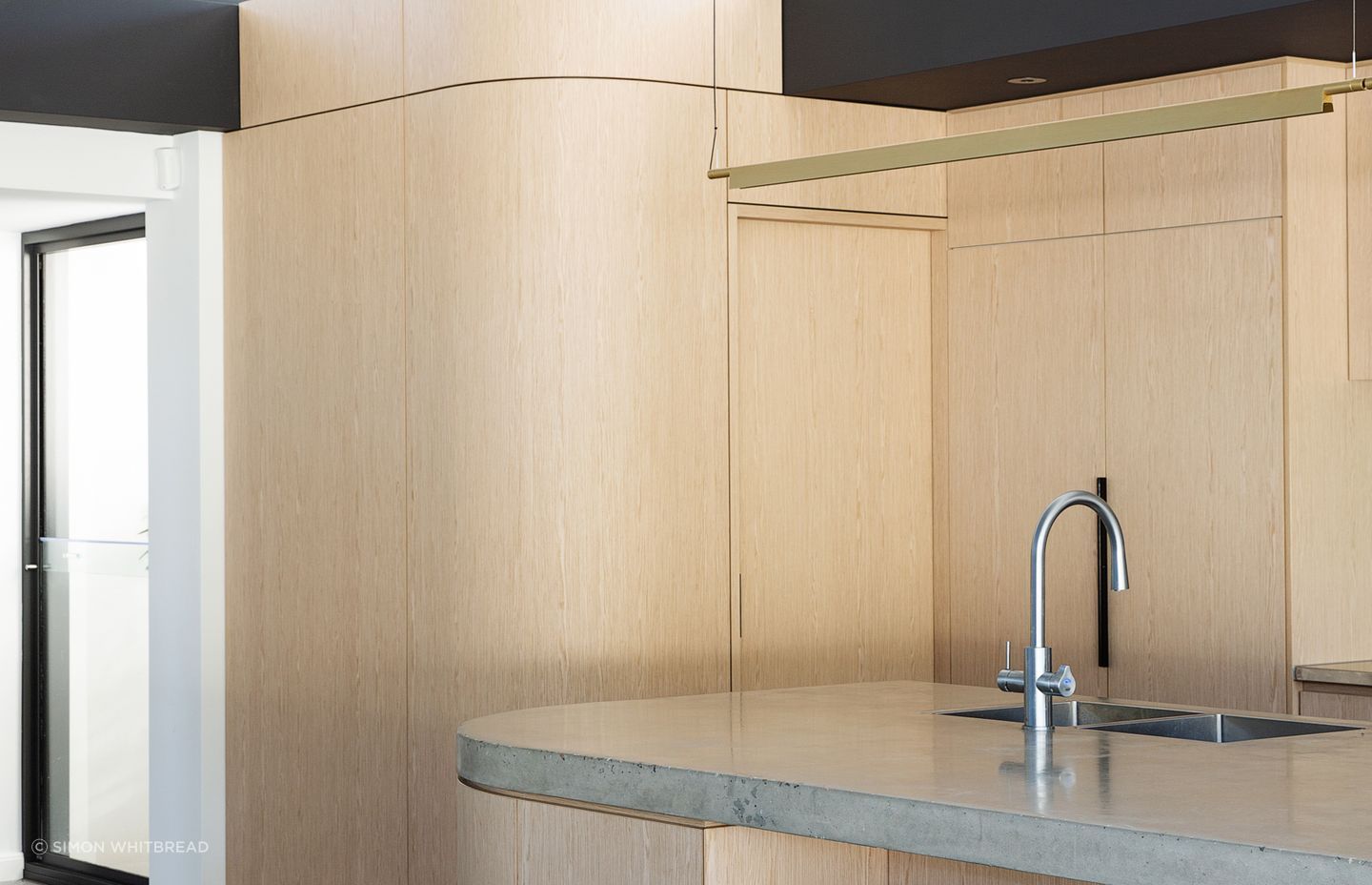 Clontarf Residence, Queensland: This residential project features Navlam Italian Oak, a pre-finished reconstructed timber veneer that achieves a warm oak tone throughout, inviting everyone into the space.