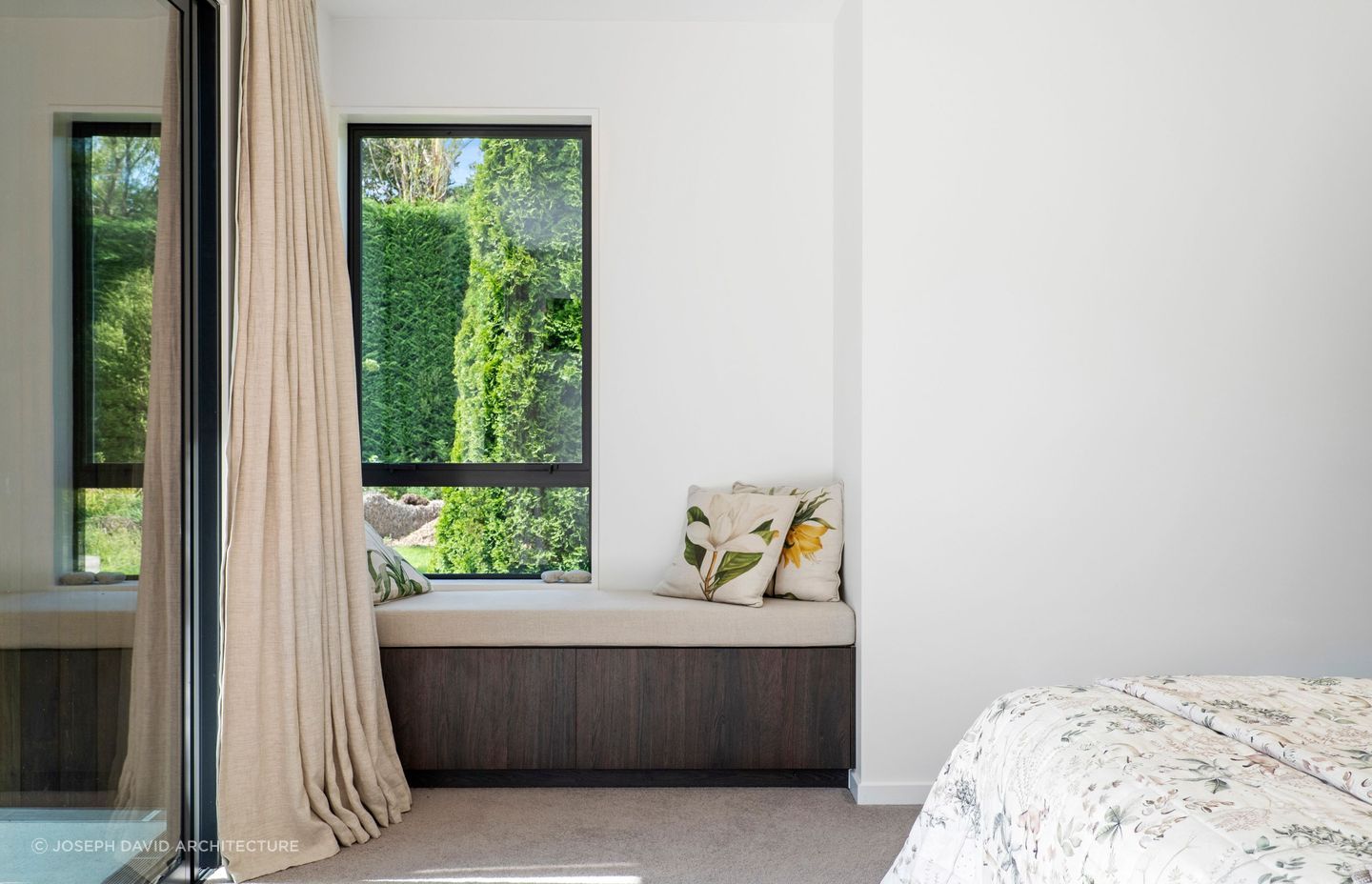 Complete with a built-in window seat, the master suite is a retreat from the rest of the home.